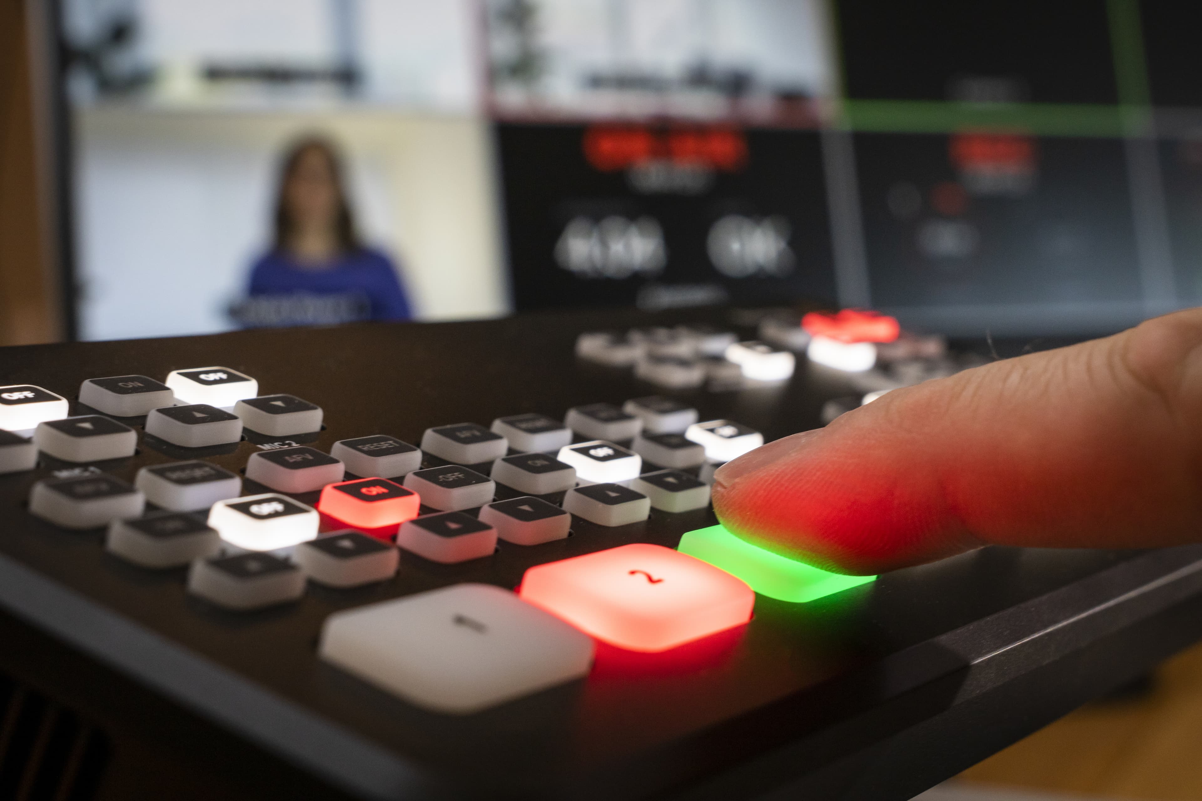 Live concert performance with dramatic stage lighting