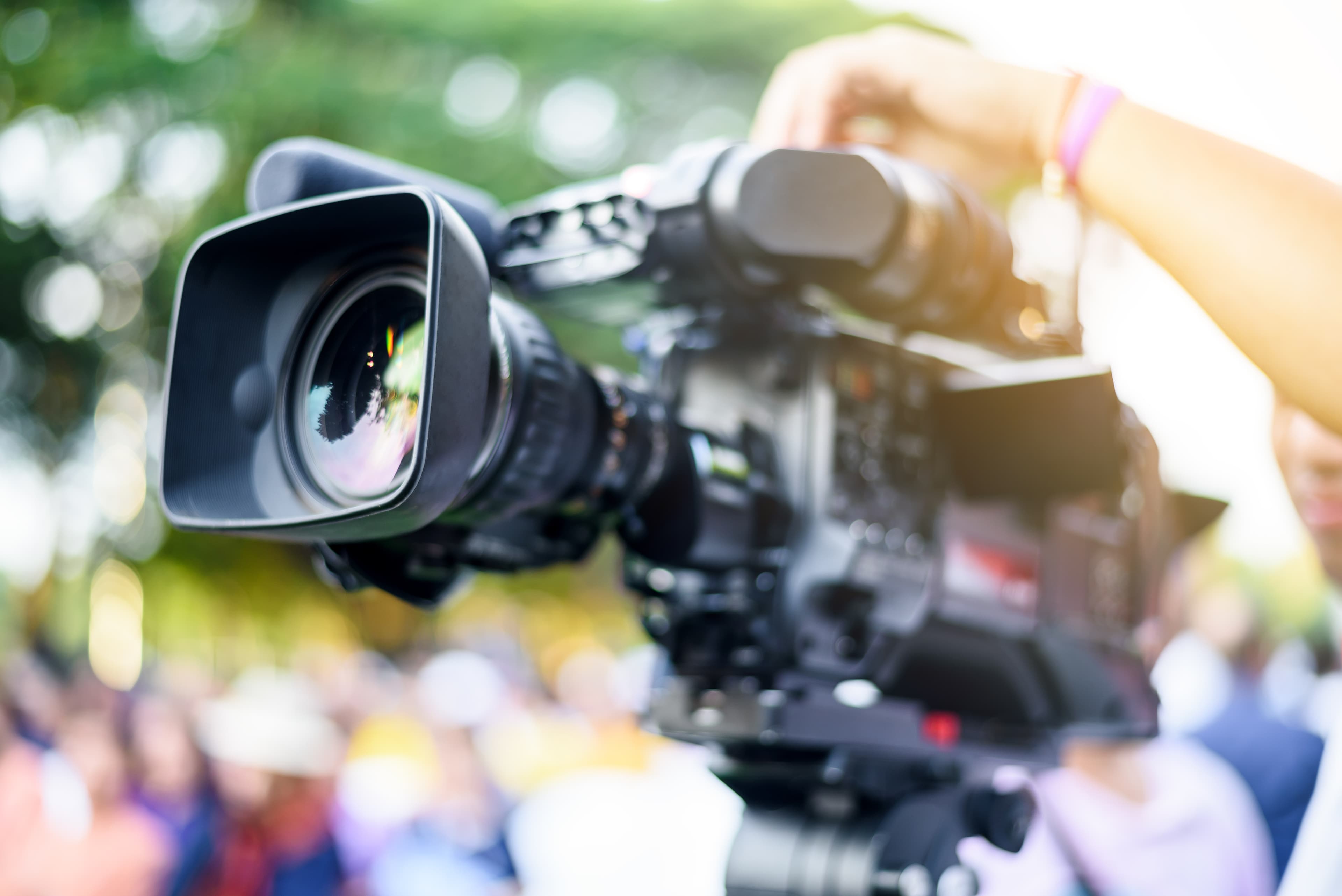Concert performance with vibrant lighting and audience