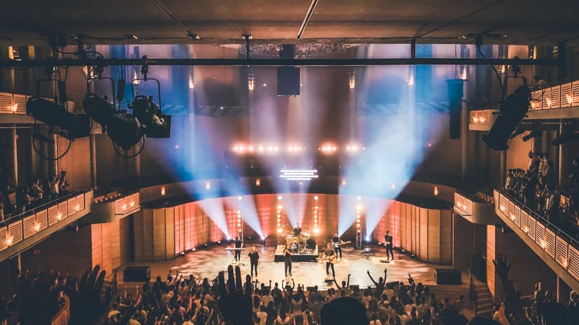 Students performing in a school auditorium concert